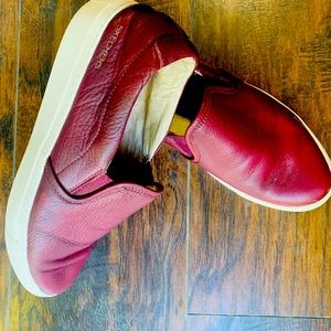 Super comfortable red wine SKECHERS. Still a lot of life in them.